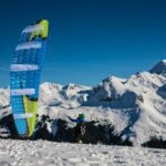 En hiver, pratiquez du parapente et profitez de sublimes paysages enneigés !